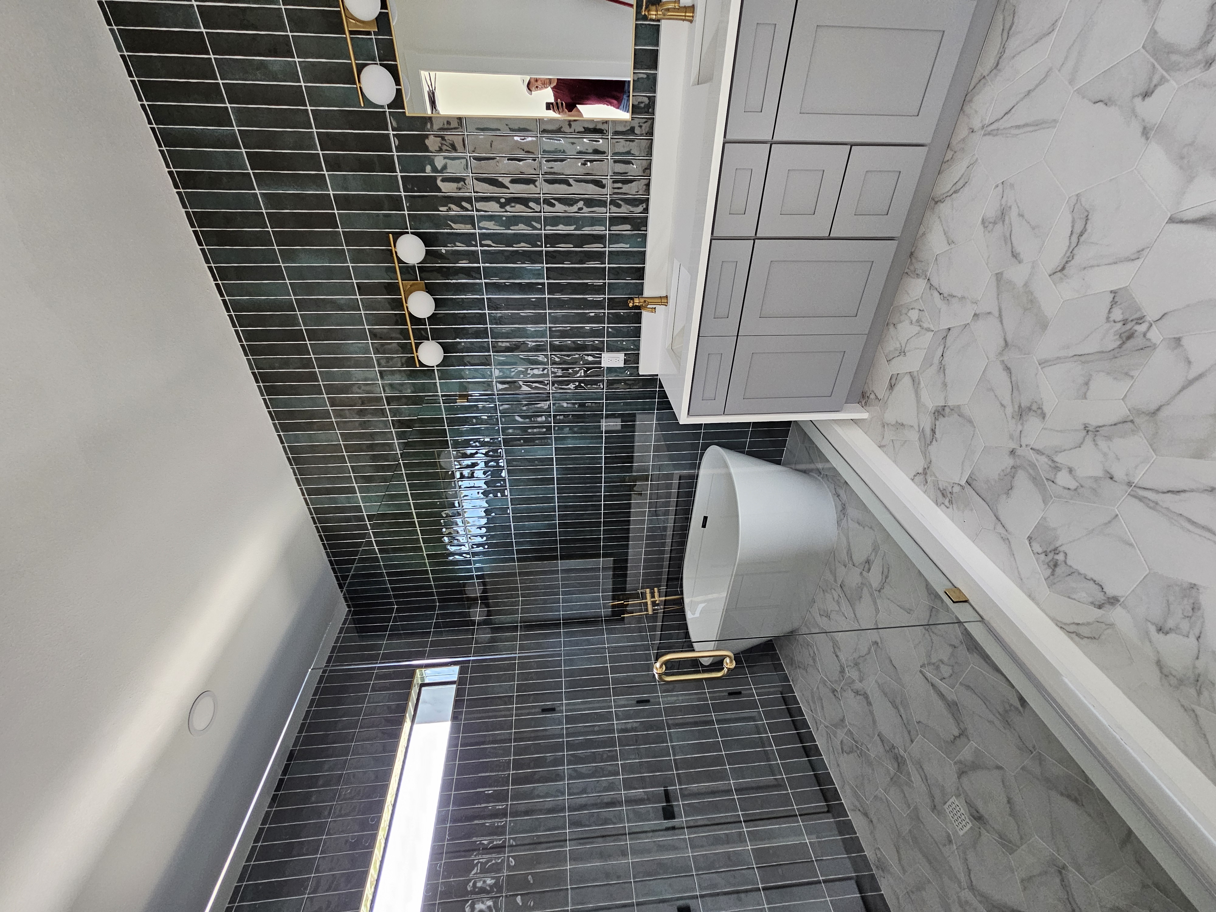 Designer master bathroom dark tile new construction Tampa - Graham Group GGC
